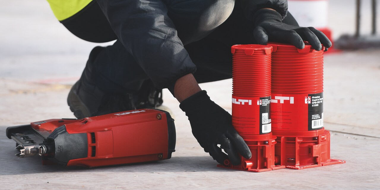 Hilti firestop cast-in sleeves for cables and pipes being placed on concrete slabs after laying them out in BIM