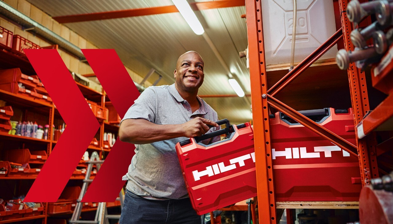 Tool Crib Manager putting away a Hilti Tool Box on a shelf in the warehouse