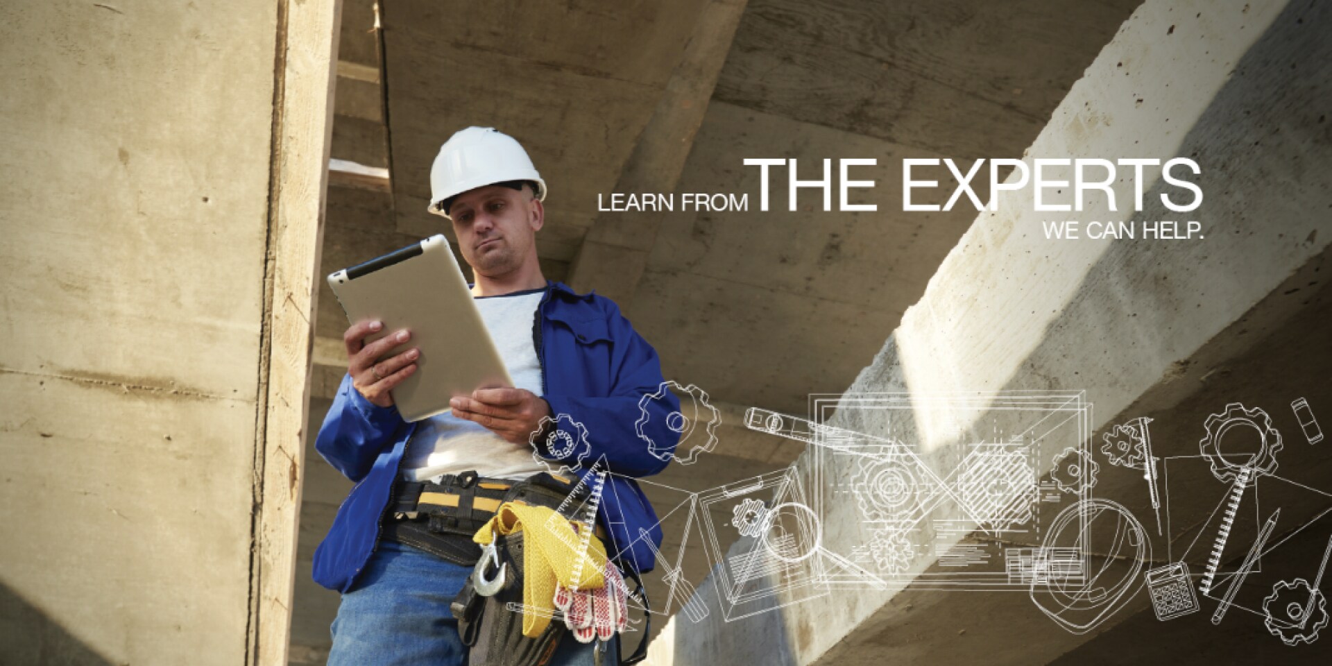 Person at jobsite checking his ipad.