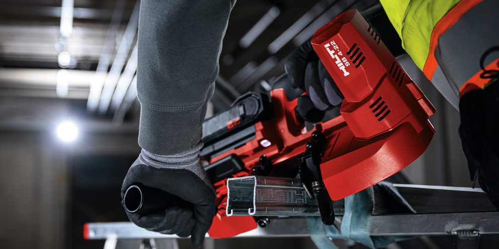 man using reciprocating saw 