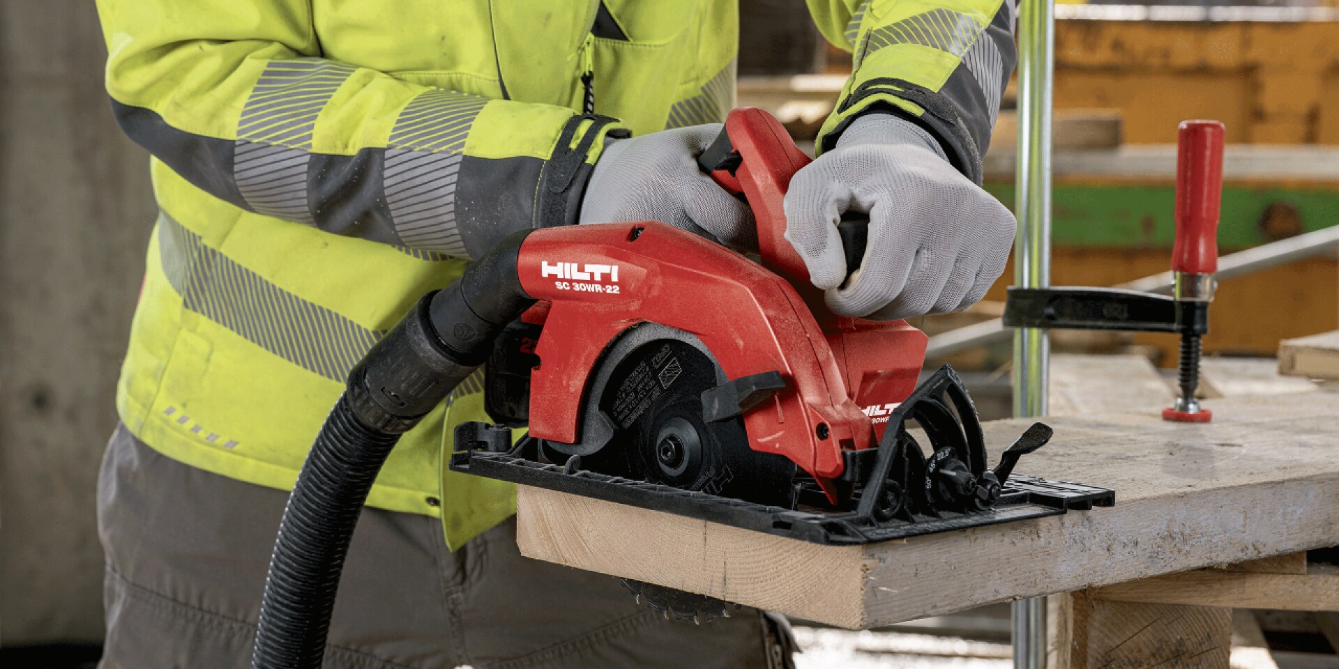 man using Hilti rotating laser on jobsite
