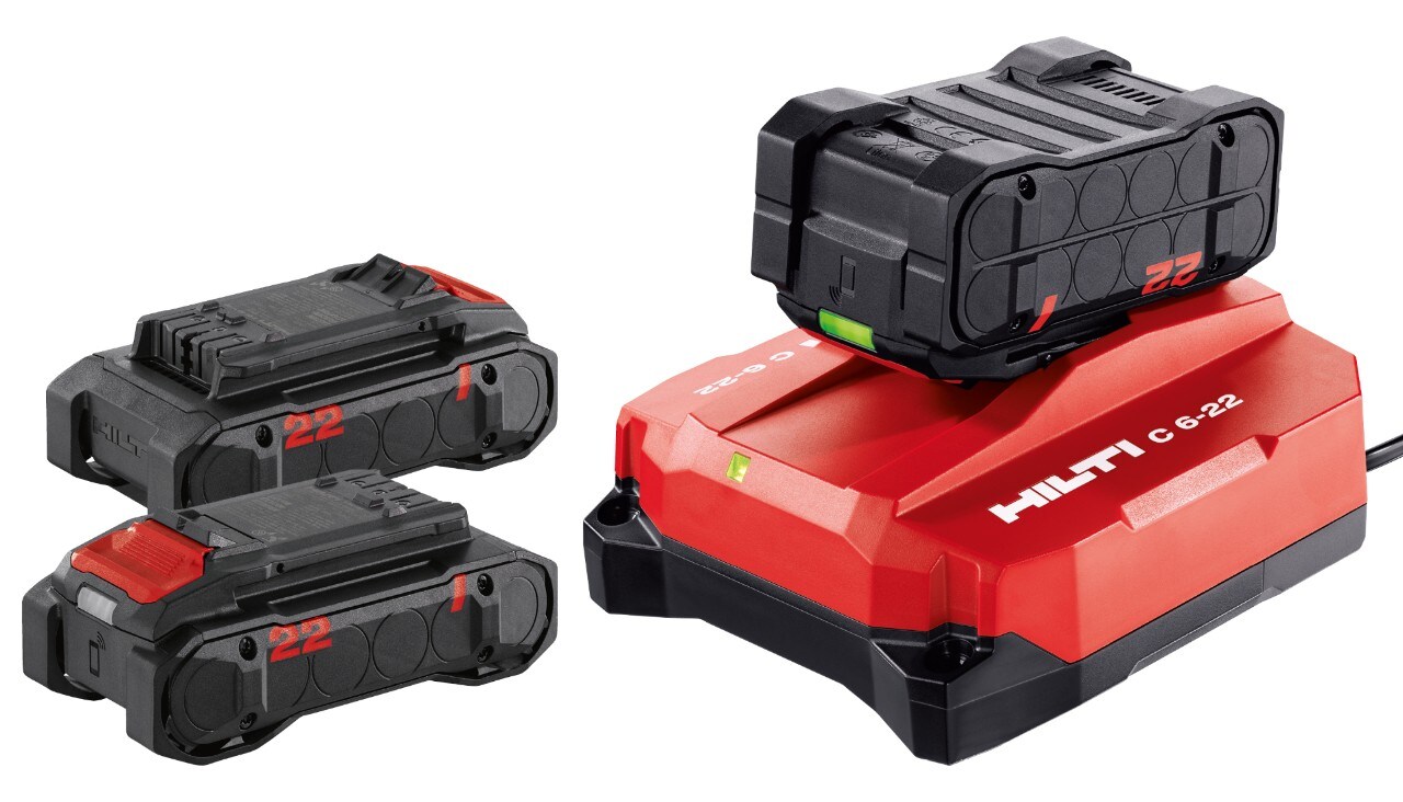 Hilti battery bundle on display, 3 batteries and a charger