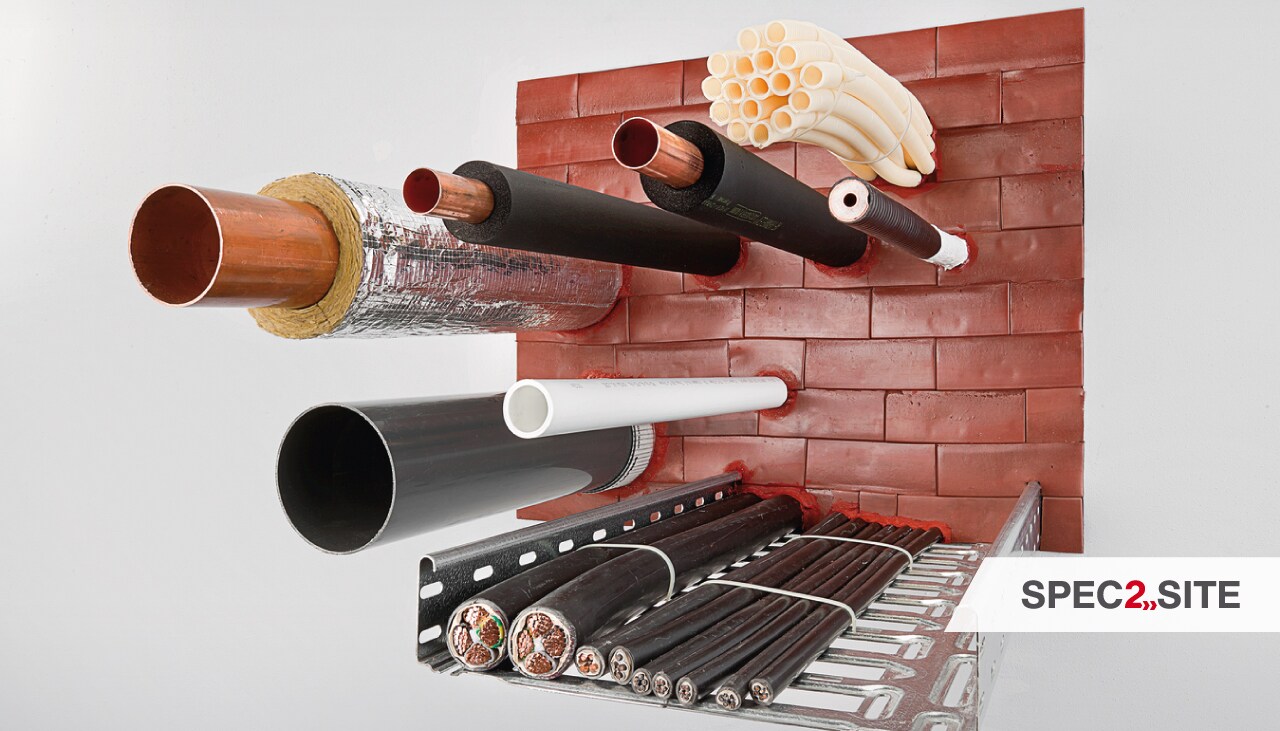 a variety of multidisciplinary penetrations passing through firestopping bricks
