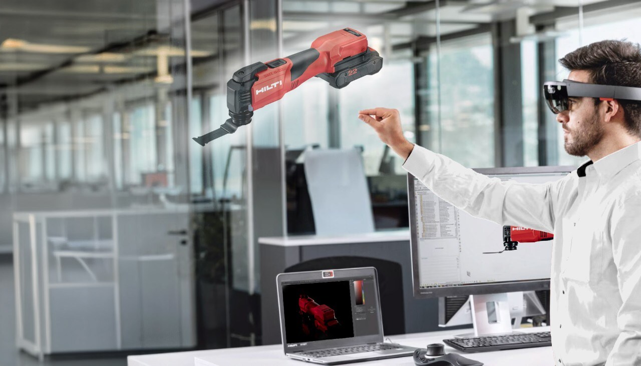 Un collaborateur Hilti visualise un Multi tool en 3D avec des lunettes de réalité augmentée
