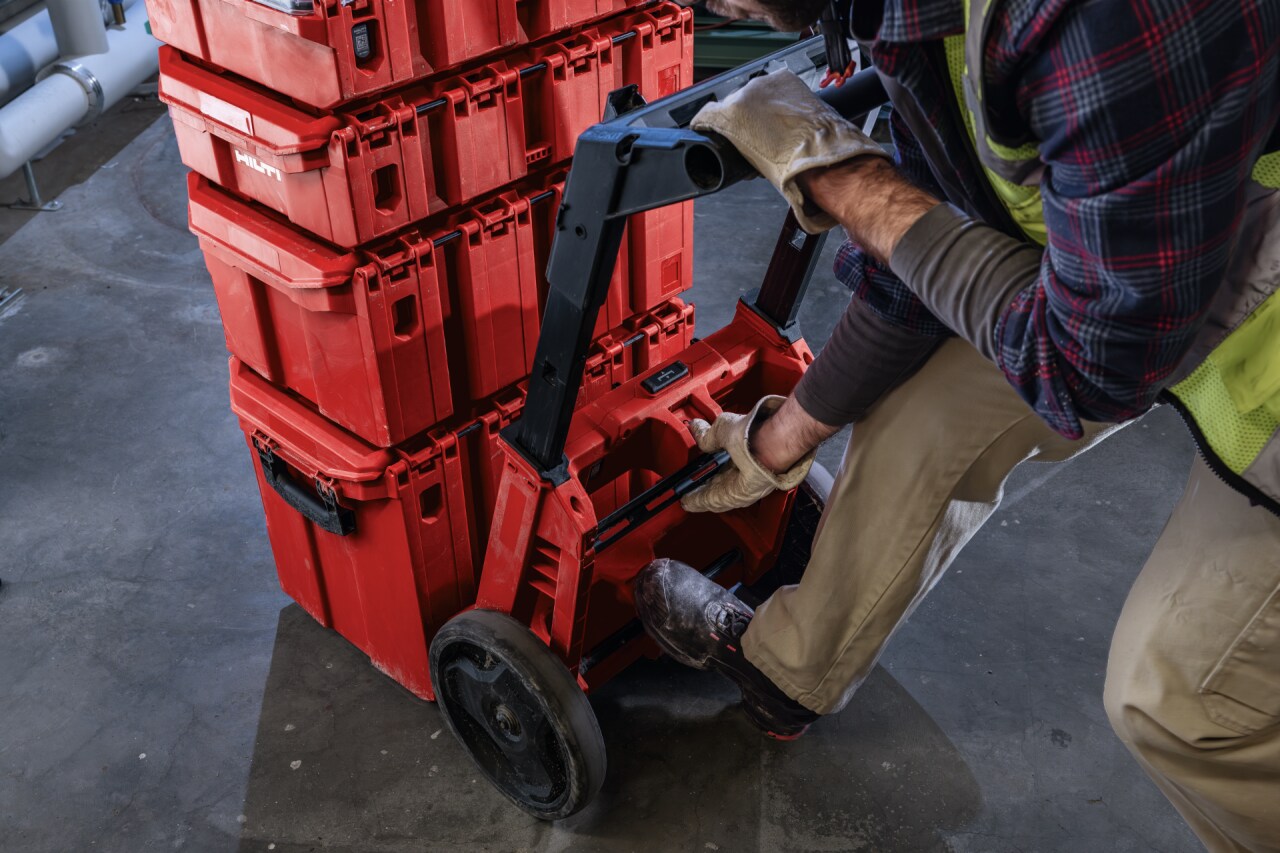 Man racking the Prokit with multiple compartments