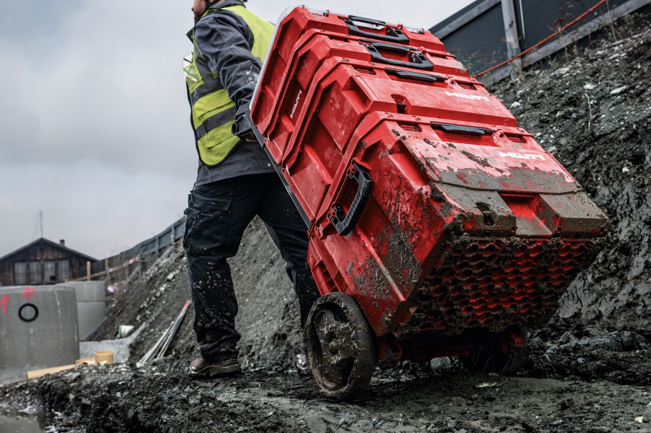 Man rolling Prokit in the mud Lanscape