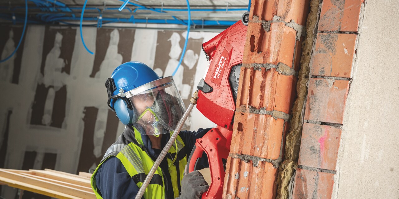 Wet concrete cutting helps to reduce dust on the jobsite with tools like the DCH 300-X diamond cutter