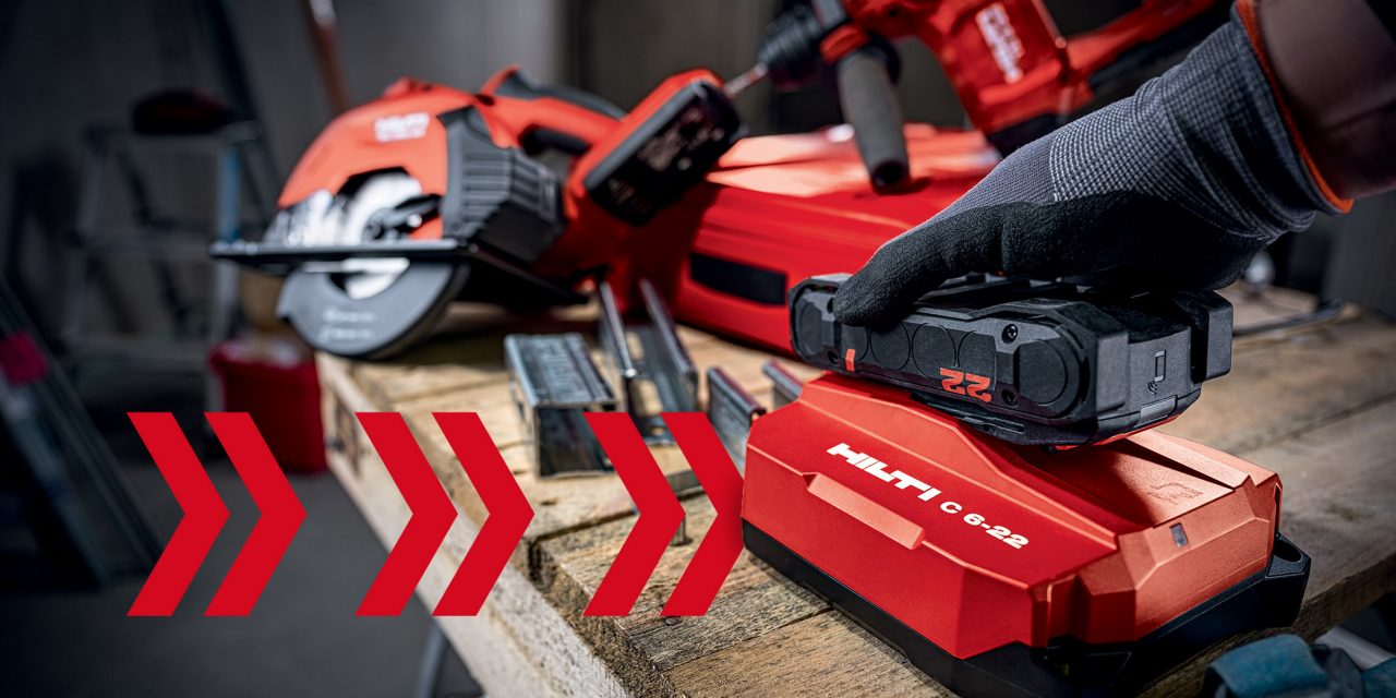 image of person putting a battery in a charger