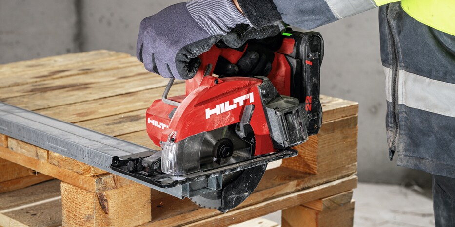 man using circular saw